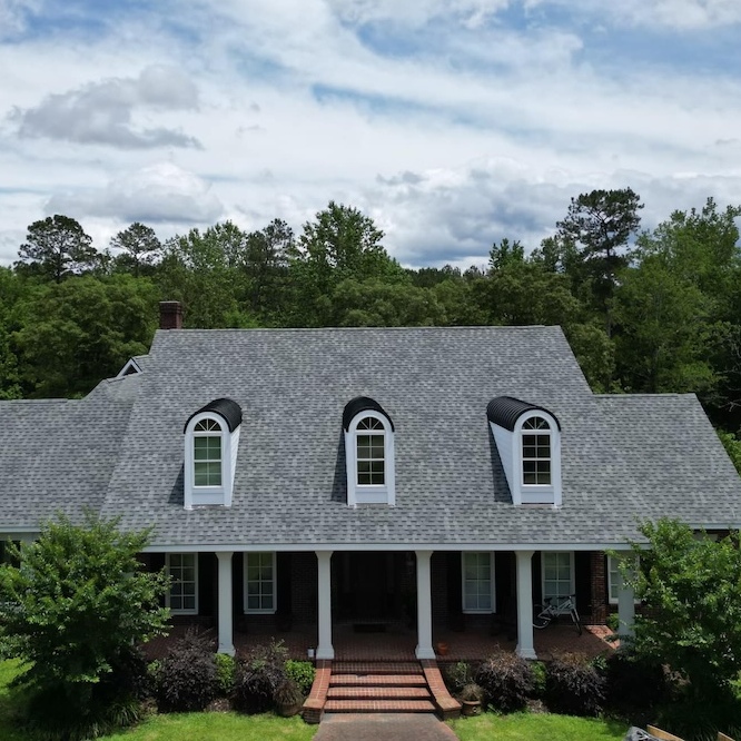 A brand-new roof replacement on a suburban home.