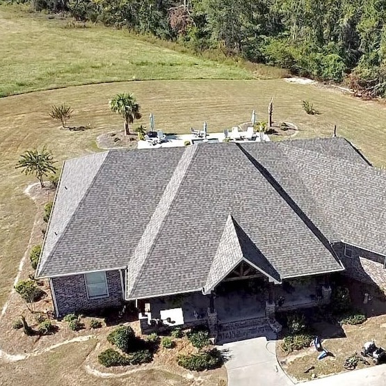 Grey shingle roof system.